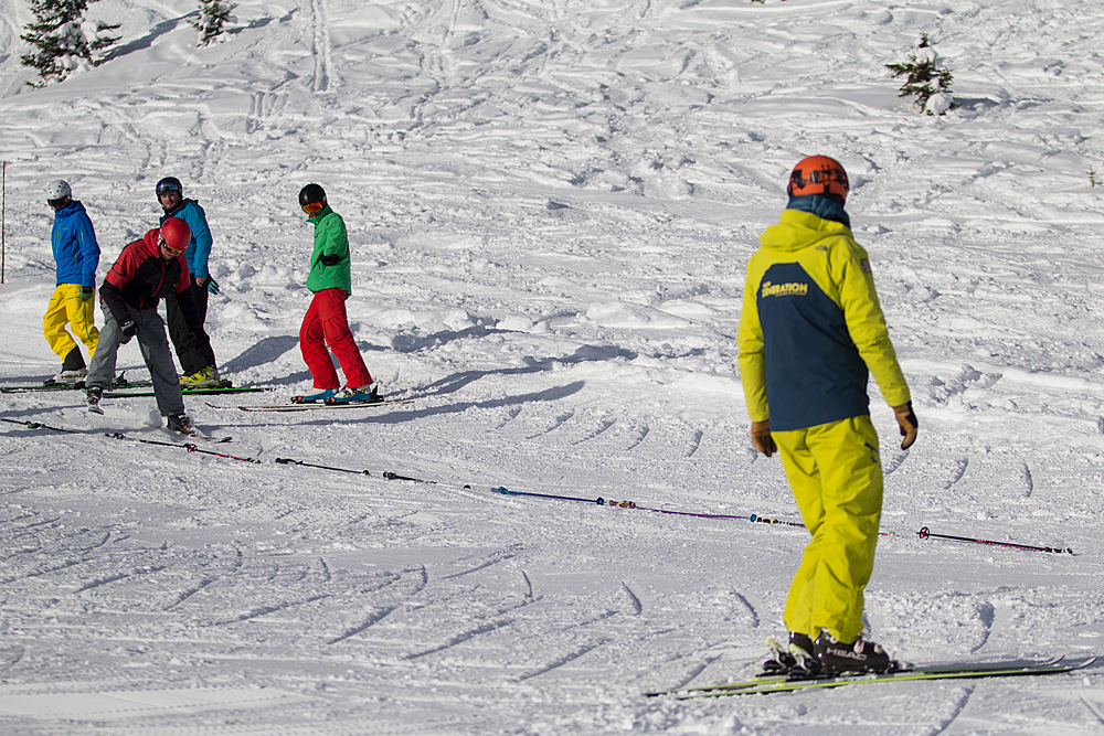 Students practising drills during their ski instructor training